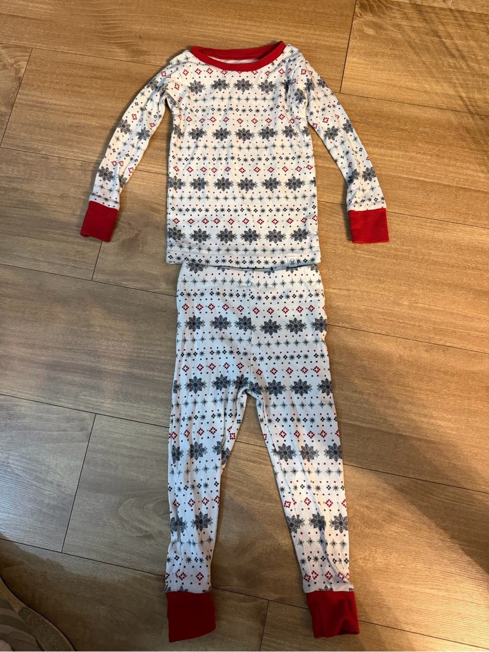 The Honest Company White Snowflake Print Pajama Set with Red Trim